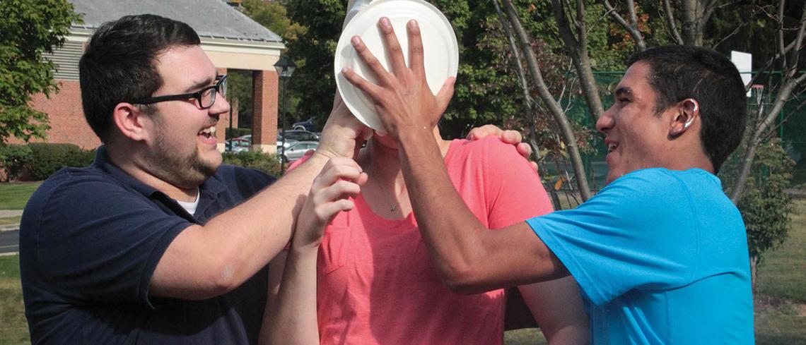 Student getting pied in the face